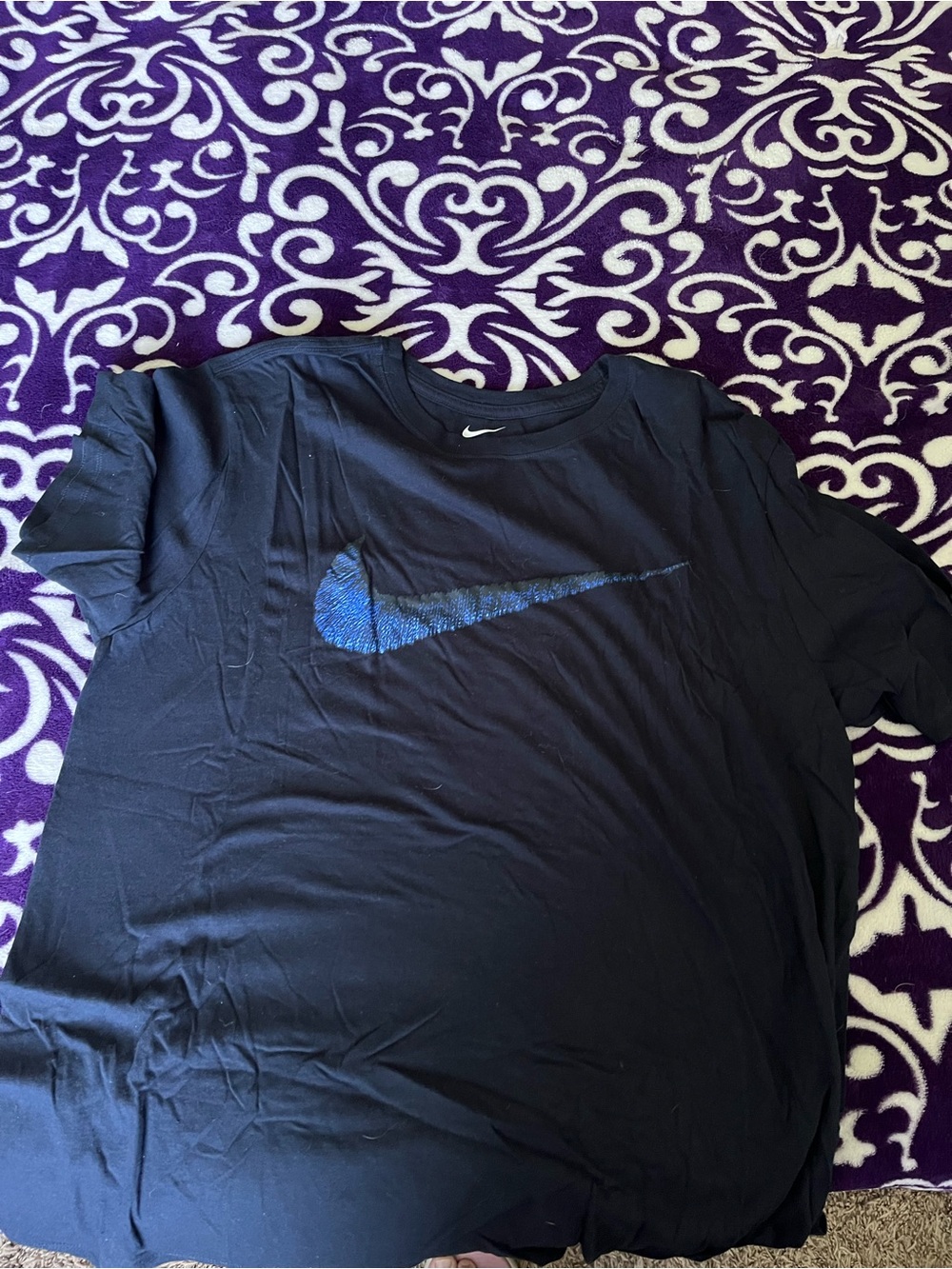 Nike Men’s Black Short Sleeve Tee with Blue Swoosh